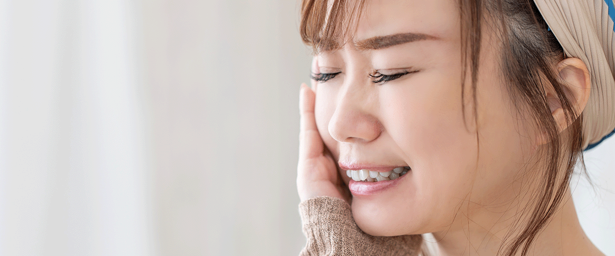 知覚過敏に悩む女性